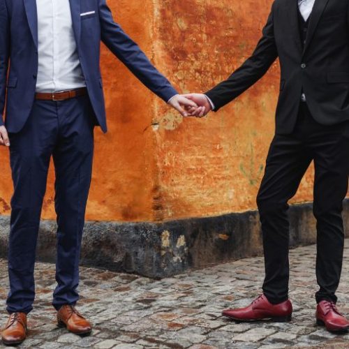 Gay couple in suits in Melbourne
